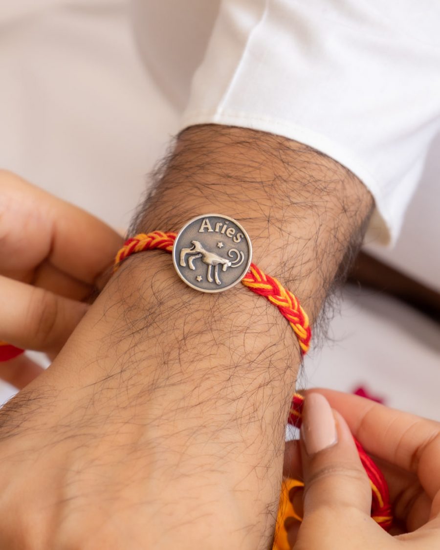 Rakva 92.5 Sterling Silver Rakhi For Brother | Aries Sign Bracelet | 2 in 1 Brooch/Rakhi for Men and Women | With Roli Chawal Tilak for Kids